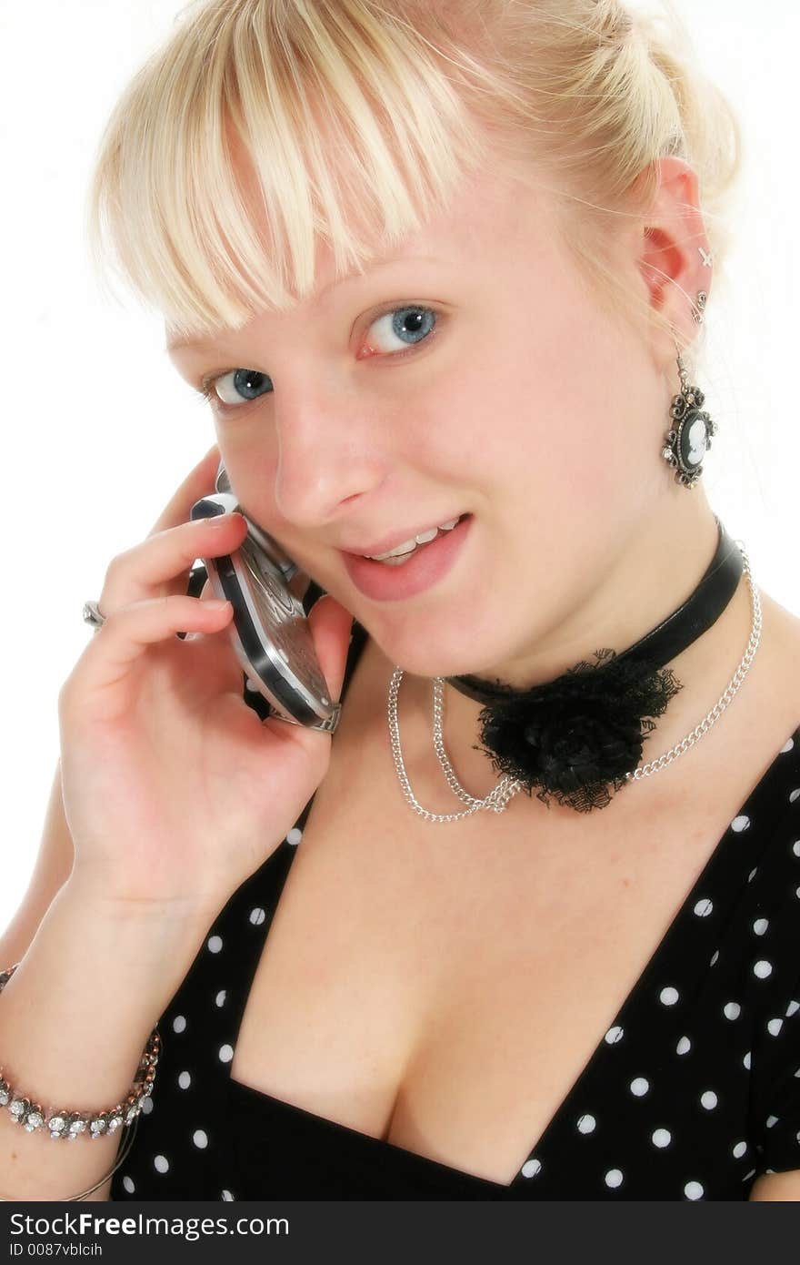 Beautiful German seventeen year old teen girl with cellphone. Natural beauty - no make up. Beautiful German seventeen year old teen girl with cellphone. Natural beauty - no make up.