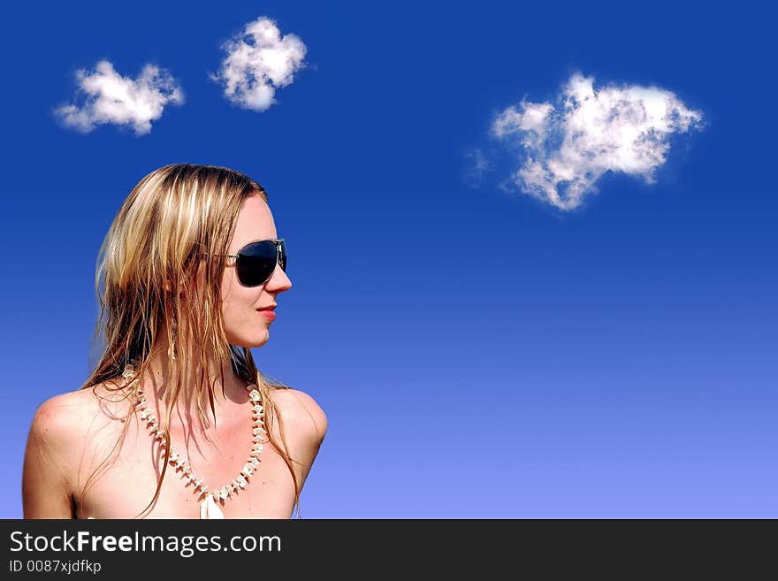 Girl on blue sky with clouds