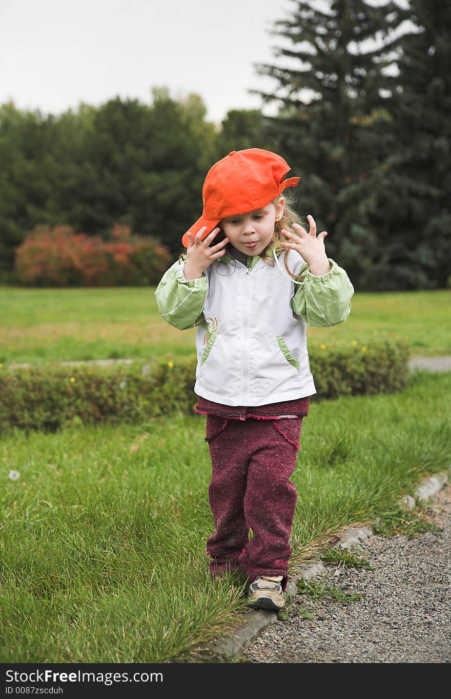 Little baby with cap in autumn. Little baby with cap in autumn