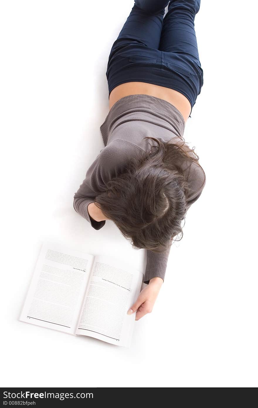 Young woman reading a book