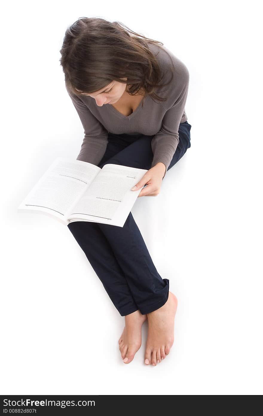 Young woman reading a book