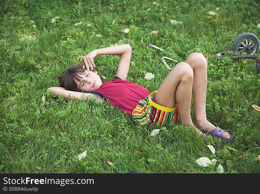 Boy rests by summer