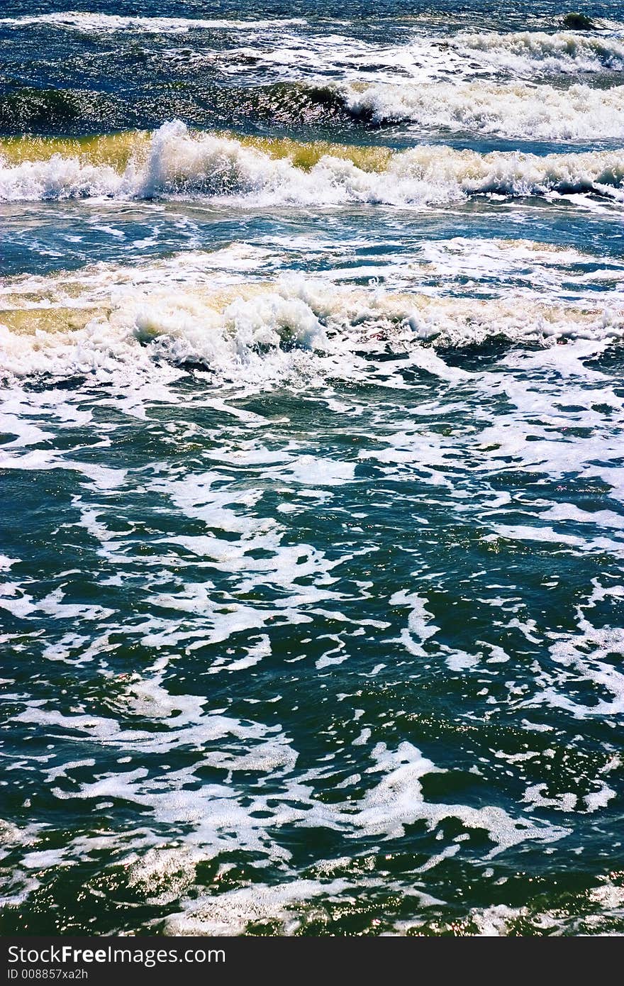 Sea waves on beaches, sands, foam