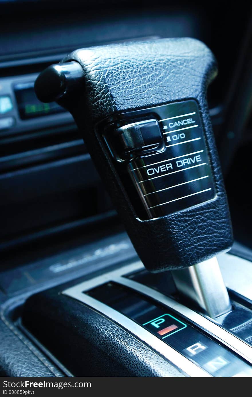 A gear shifter in a sports car