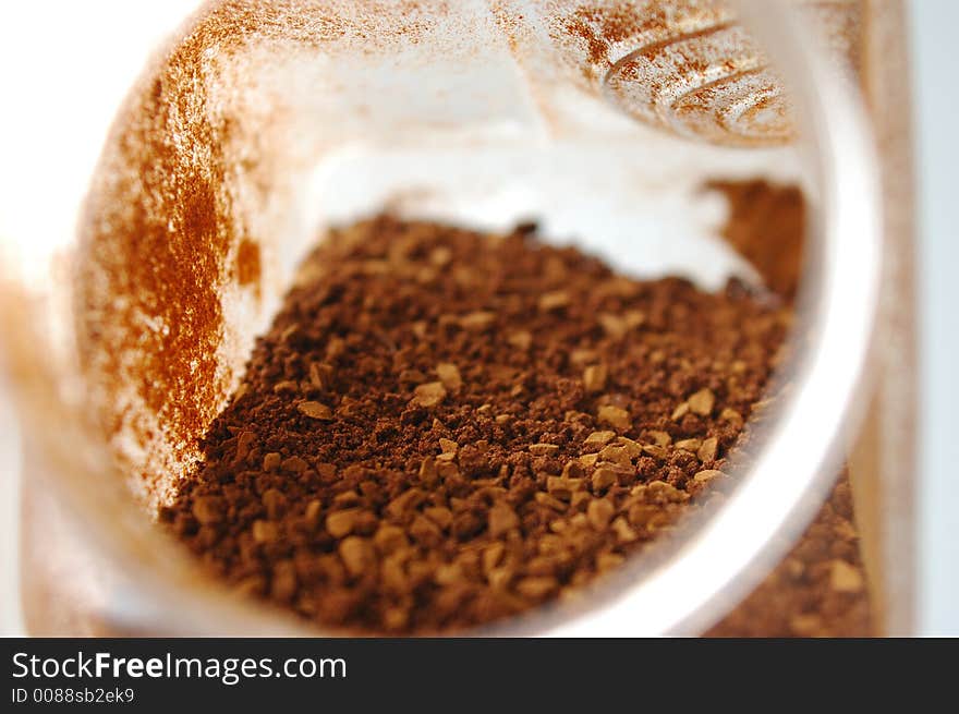 Instant coffee from Thailand in a glass container.