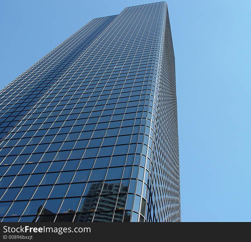 Reflective glass building in downtown Boston. Reflective glass building in downtown Boston.