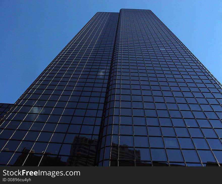 Reflective glass building in downtown Boston. Reflective glass building in downtown Boston.