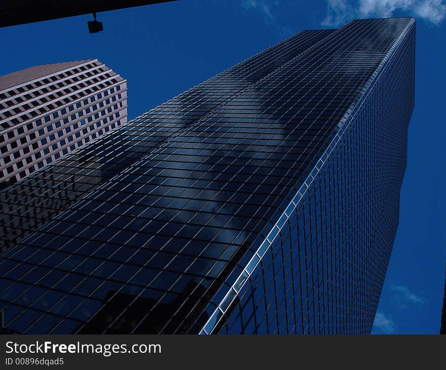 Reflective glass building in downtown Boston. Reflective glass building in downtown Boston.