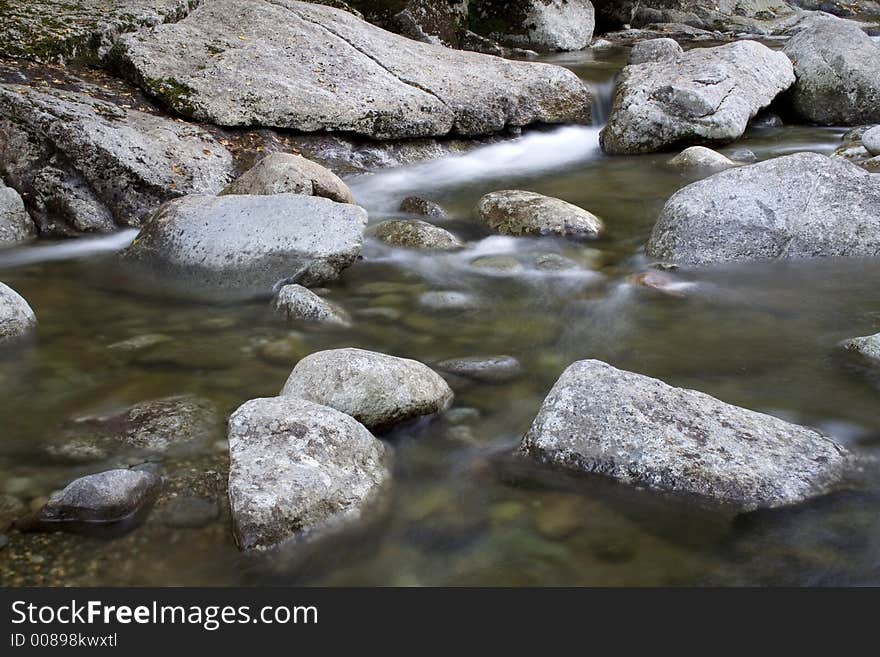 Clear and cold mountain brook. Clear and cold mountain brook.