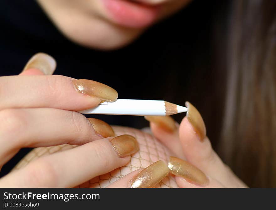 Woman making up her nails. Woman making up her nails