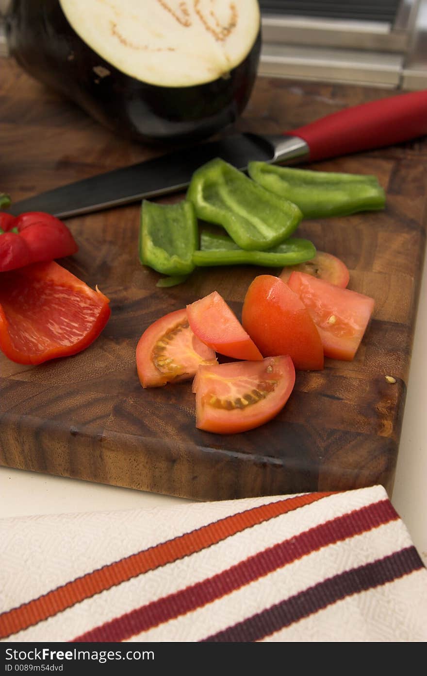 Fresh vegetables sliced on cutting board. Fresh vegetables sliced on cutting board