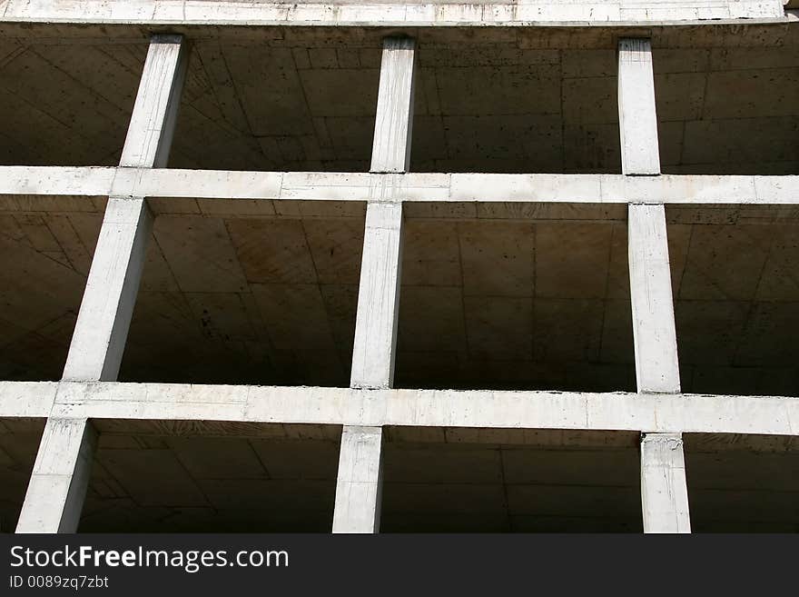 Construction of a apartment building. Construction of a apartment building.