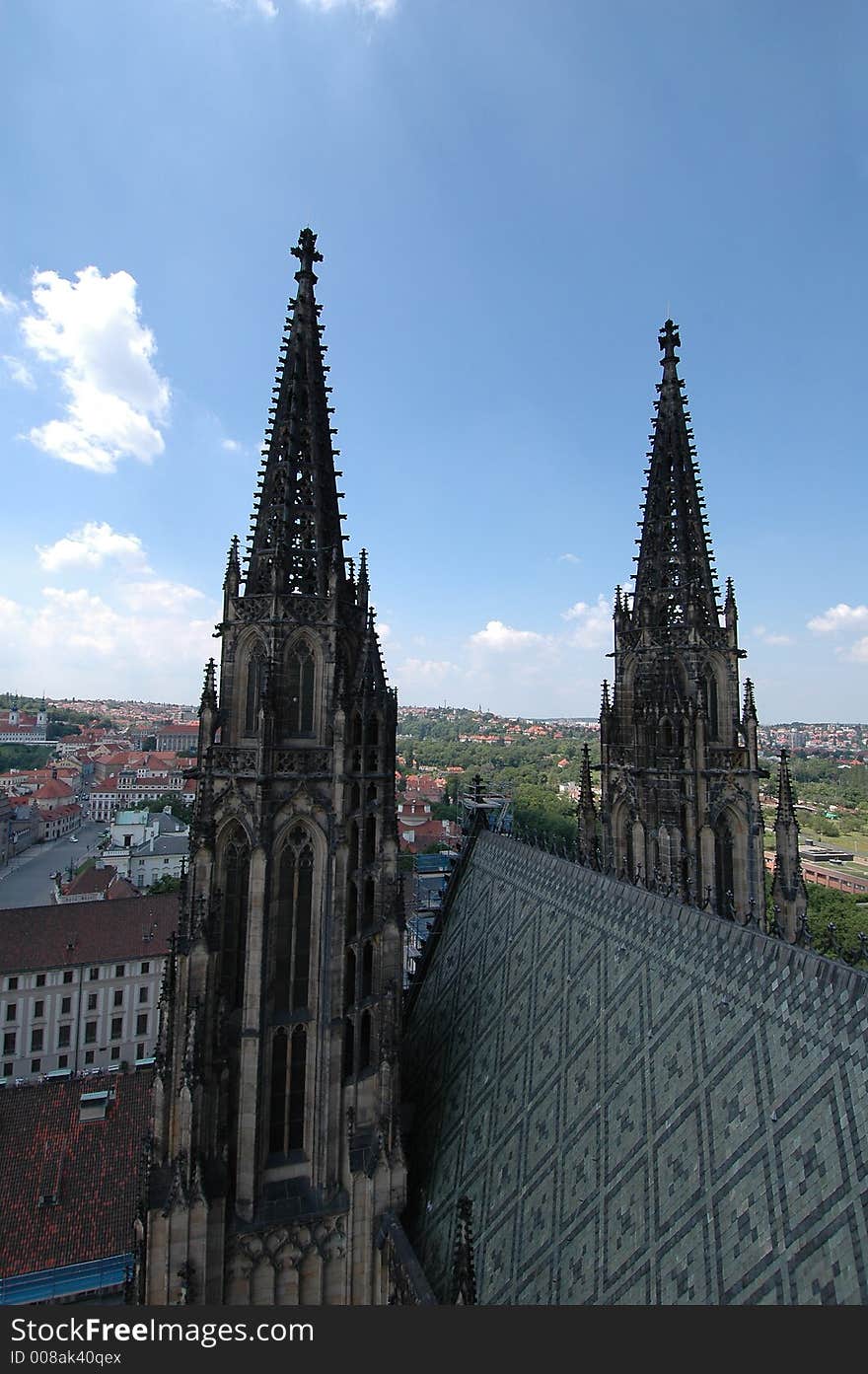 View from the Prague Castle in the Czech Republic with the cathedral towers in the foreground. View from the Prague Castle in the Czech Republic with the cathedral towers in the foreground