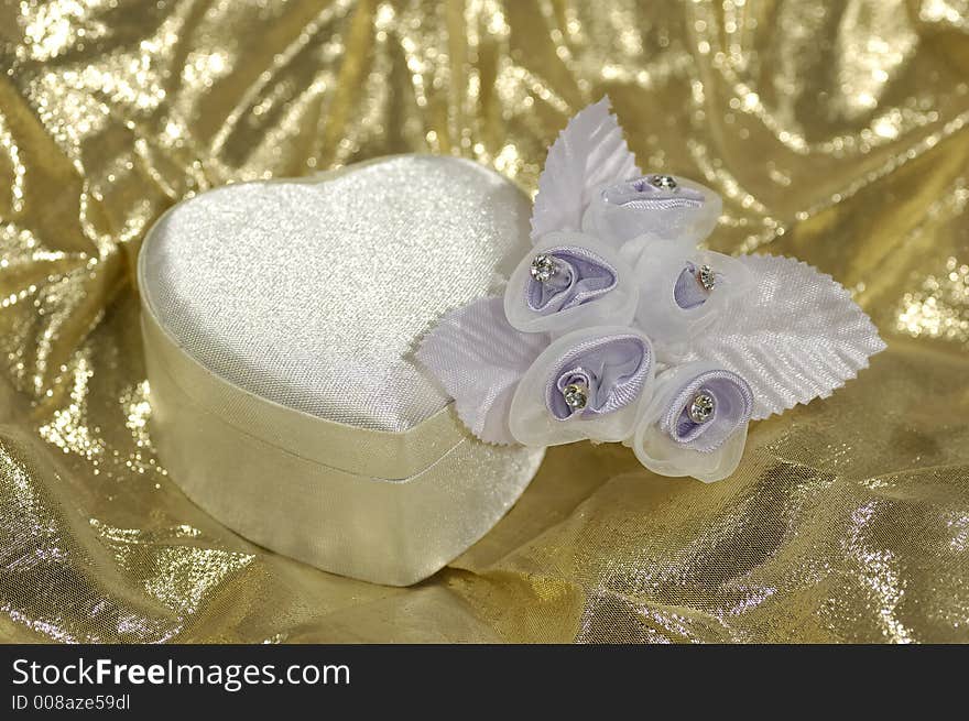 Photo of a Heart Shaped Box and Fabric Flowers. Photo of a Heart Shaped Box and Fabric Flowers