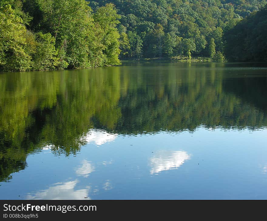 Landscape orientation of a small lake in a state park in the states. Landscape orientation of a small lake in a state park in the states.