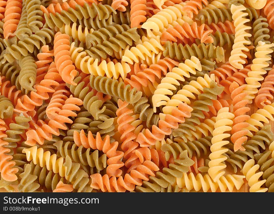 Dried tri-colored fusilli pasta