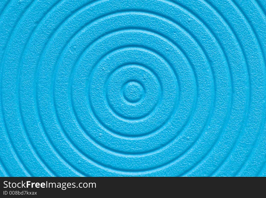 Close up of a blue spiral background.