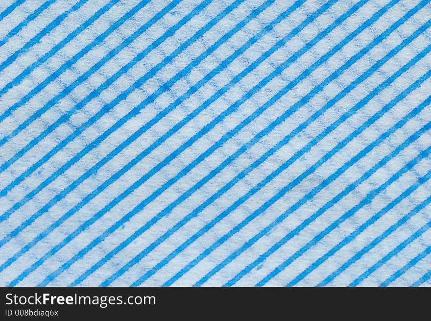 Close up of a blue and white striped fabric suitable for a background. Close up of a blue and white striped fabric suitable for a background.