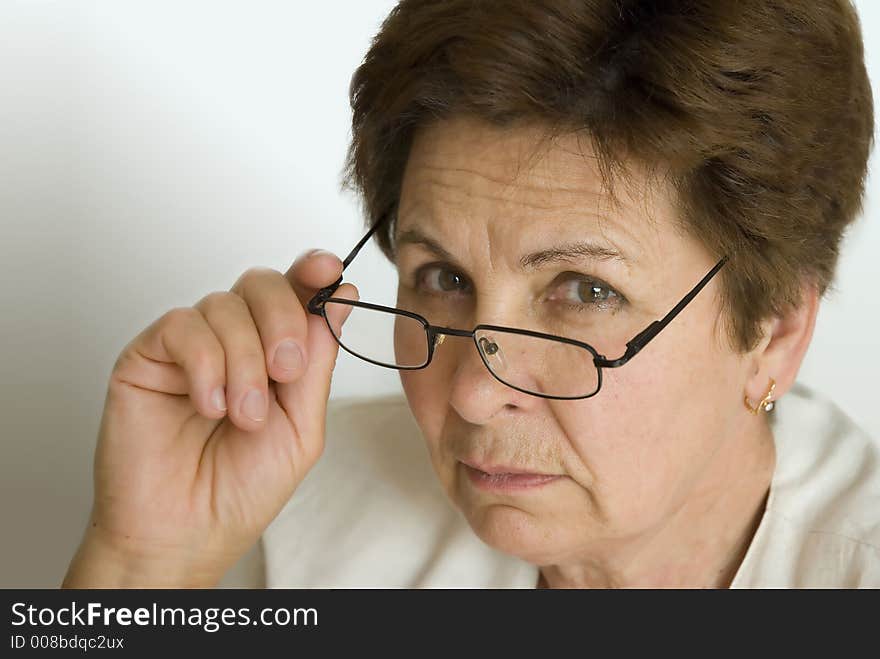 Woman in the office with the eyeglasses