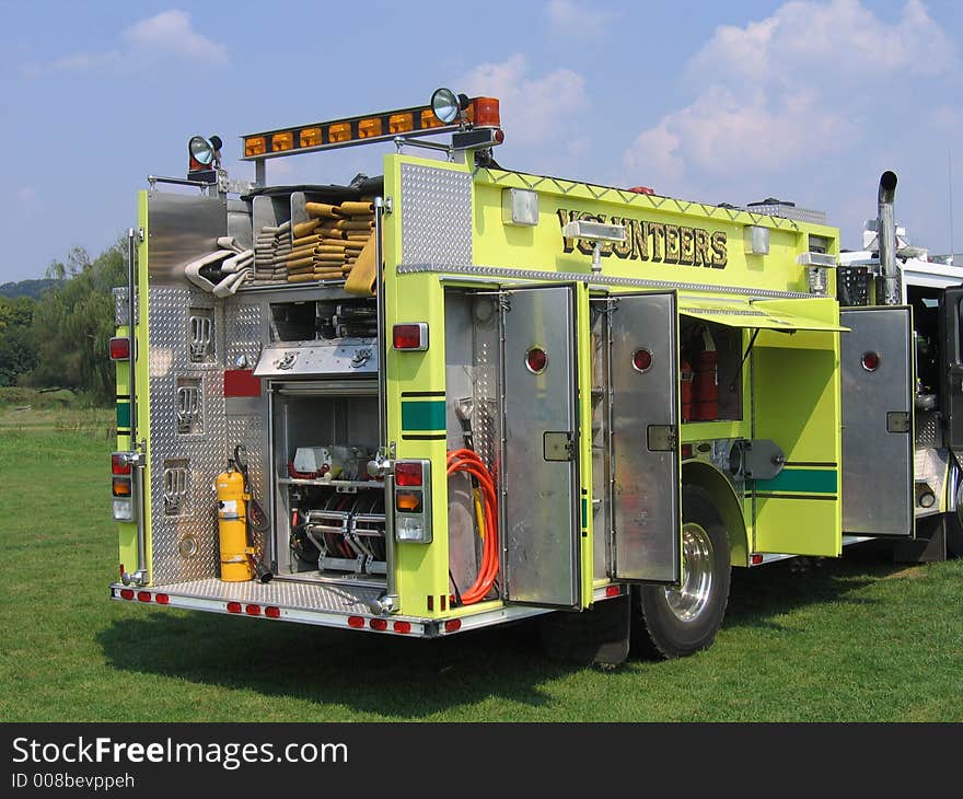 A View Of The Back End Of A Yellow Fire Engine. A View Of The Back End Of A Yellow Fire Engine