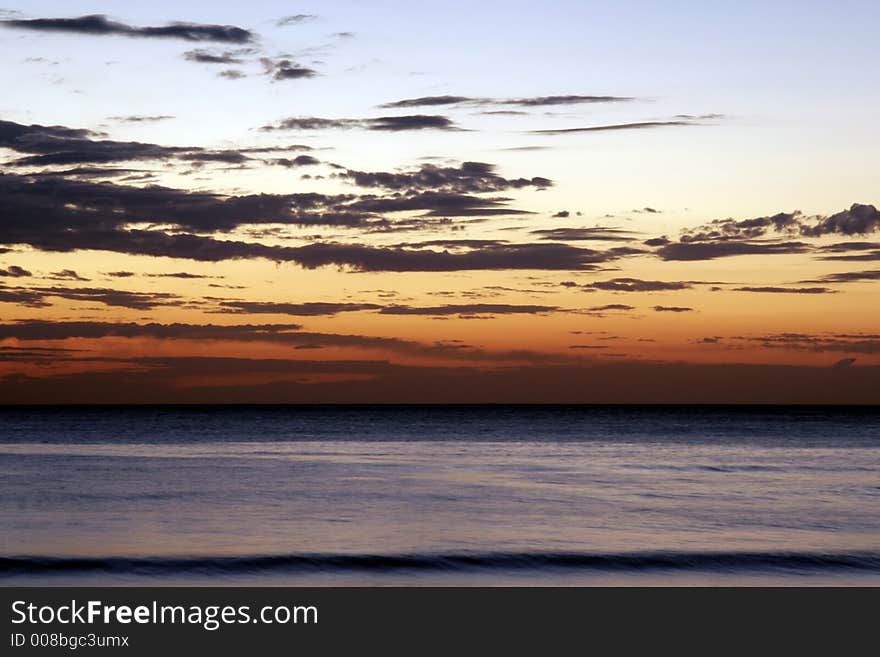 Pacific Ocean Sunrise With Dark Clouds, Sydney, Australia. Pacific Ocean Sunrise With Dark Clouds, Sydney, Australia