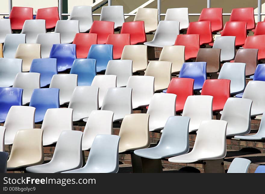 Colourful Empty Stadium Seats In Rows