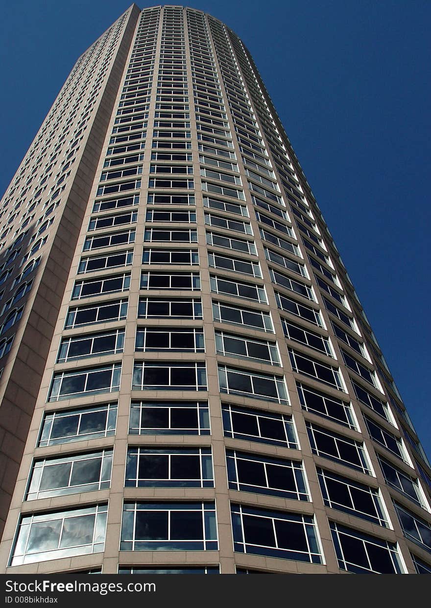 Skyscraper near Boston waterfront on a sunny autumn afternoon. Skyscraper near Boston waterfront on a sunny autumn afternoon.