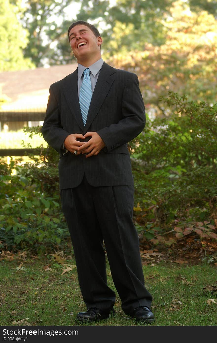 Young man in site laughing