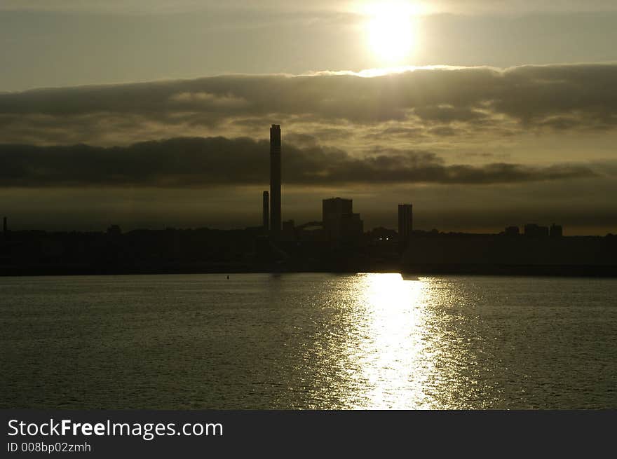 Industrial area - view from sea, silhouette