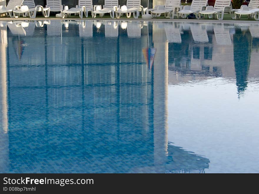 Swimming pool and hotel reflection. Swimming pool and hotel reflection