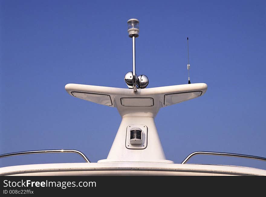 Top of a cruise ship showing radar, alarms and antenna. Top of a cruise ship showing radar, alarms and antenna.