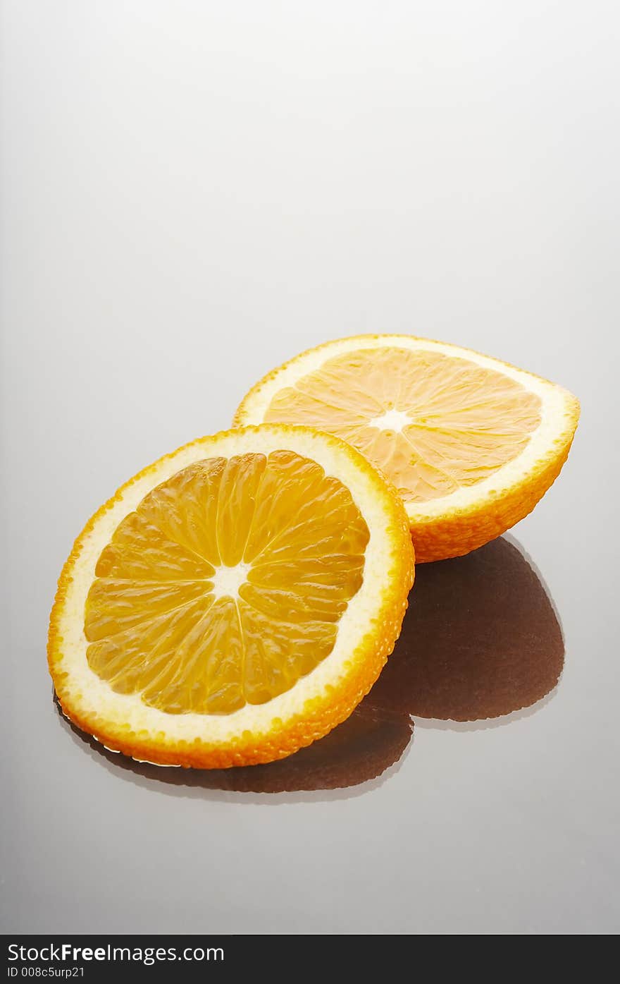 Orange fruit sliced on the two halves