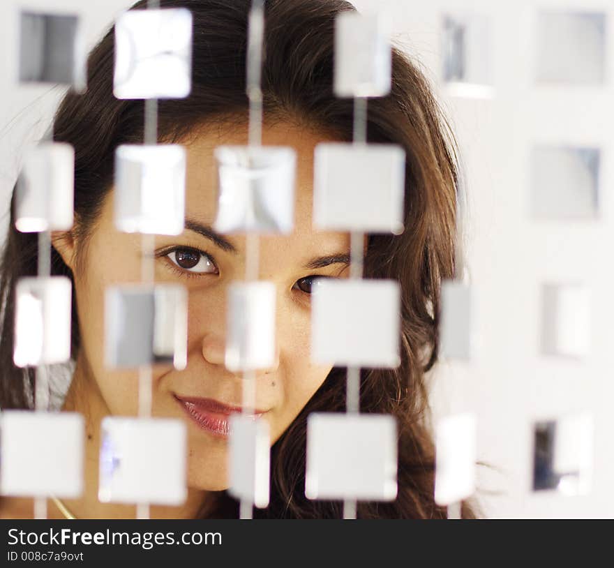 Woman Behind Mirrored Beads