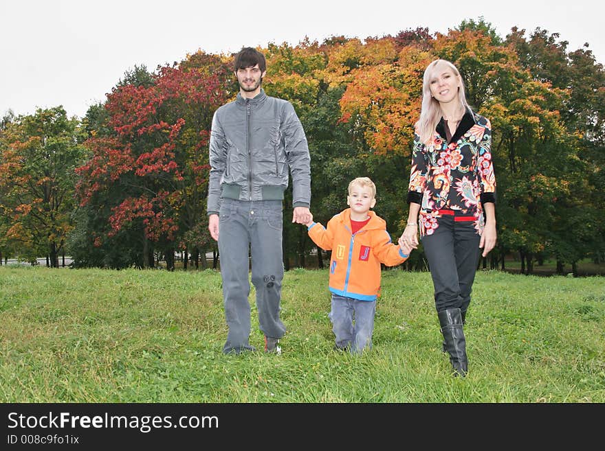 Autumn family walk in park