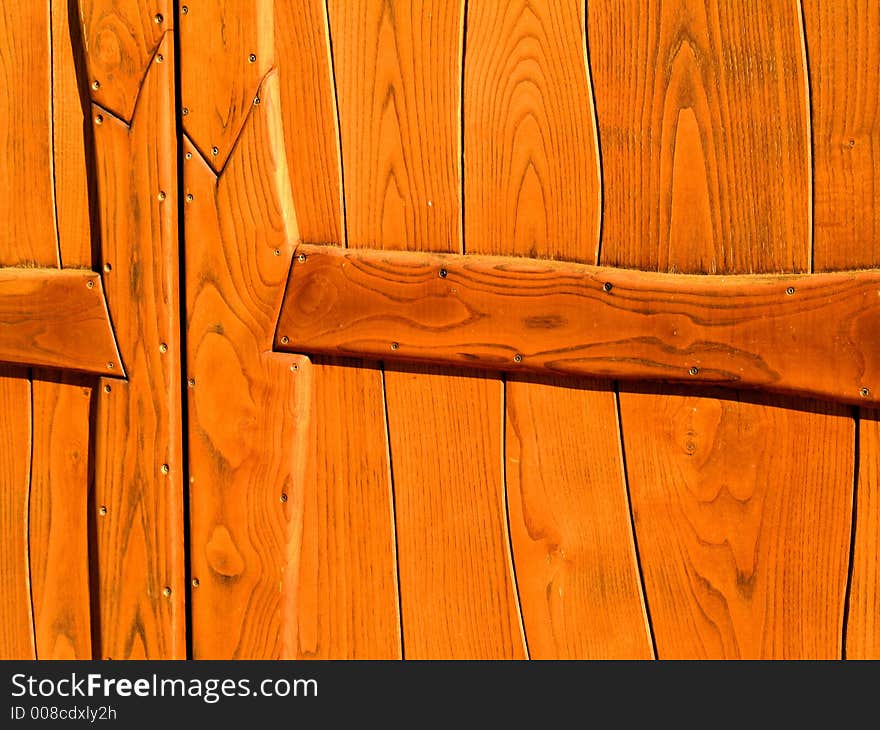 The closeup of a wooden gate. The closeup of a wooden gate