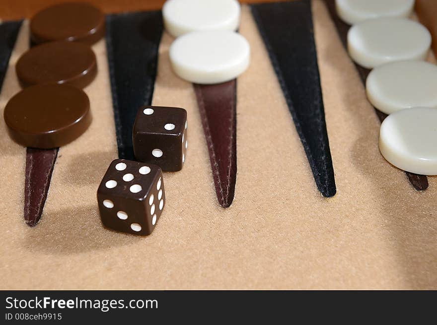 Close up of Backgammon Board and dice in-play. Close up of Backgammon Board and dice in-play