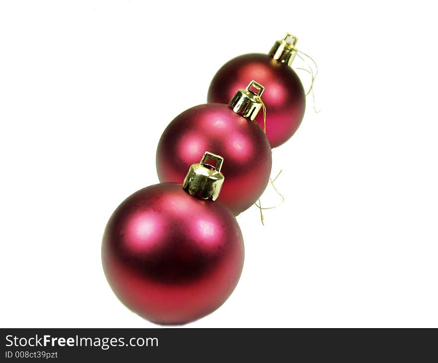 Three christmas ball on white background