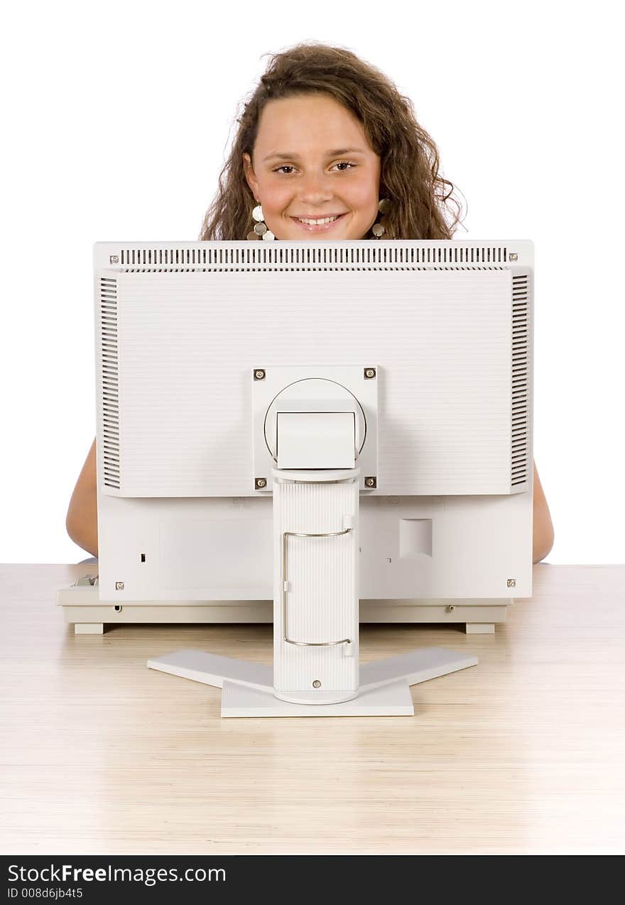 Isolated on white female teenager at the computer