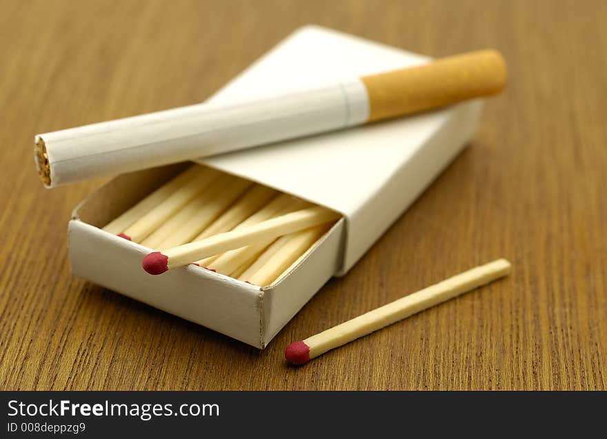 Photo of Matches and a Cigarette. Photo of Matches and a Cigarette