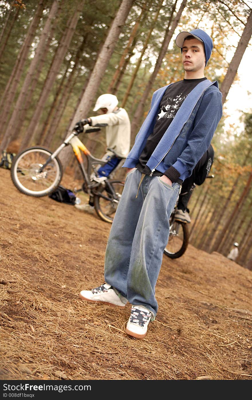 Cool dude sits on a mountain bike. Cool dude sits on a mountain bike