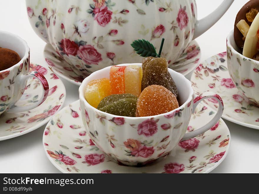 Afternoon tea with candy and chocolates close-up