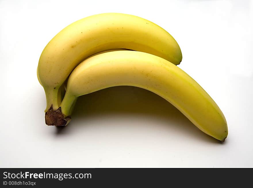 Bunch of bananas on a white studio background.