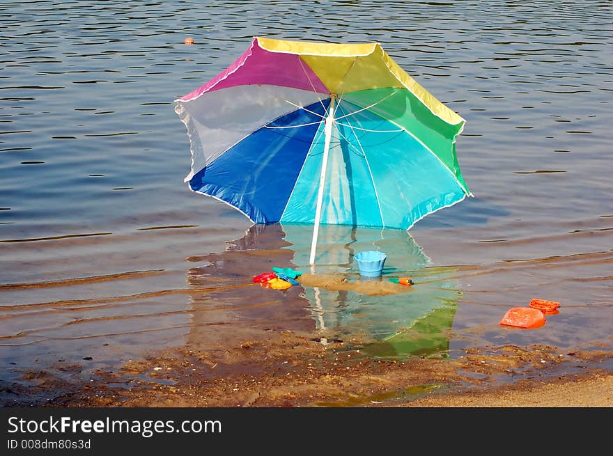 Beach Umbrella in the water. Beach Umbrella in the water