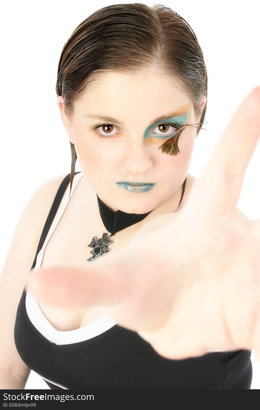 Beautiful 15 year old girl in face art. Hand reaching out for camera. Beautiful 15 year old girl in face art. Hand reaching out for camera.