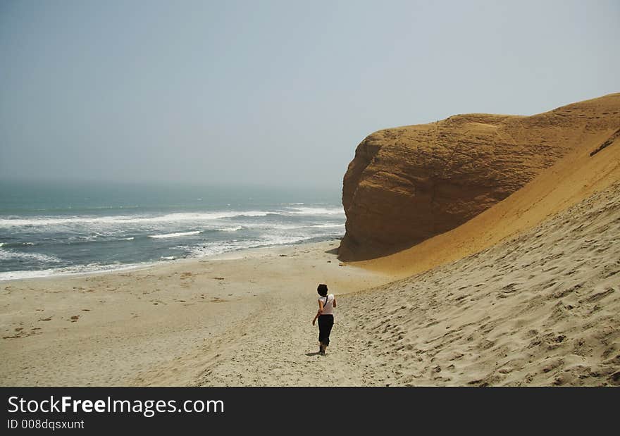 Run girl on the Pacific ocean coast. Run girl on the Pacific ocean coast