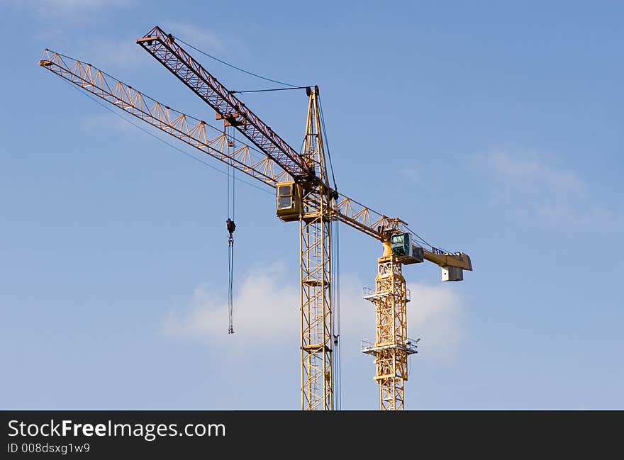 The two cranes build construction. The two cranes build construction