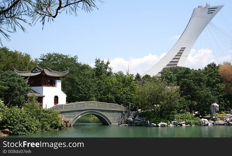 Botanical Gardens Montreal, Canada. Chinese garden lake and Pagoda with Biodome in background