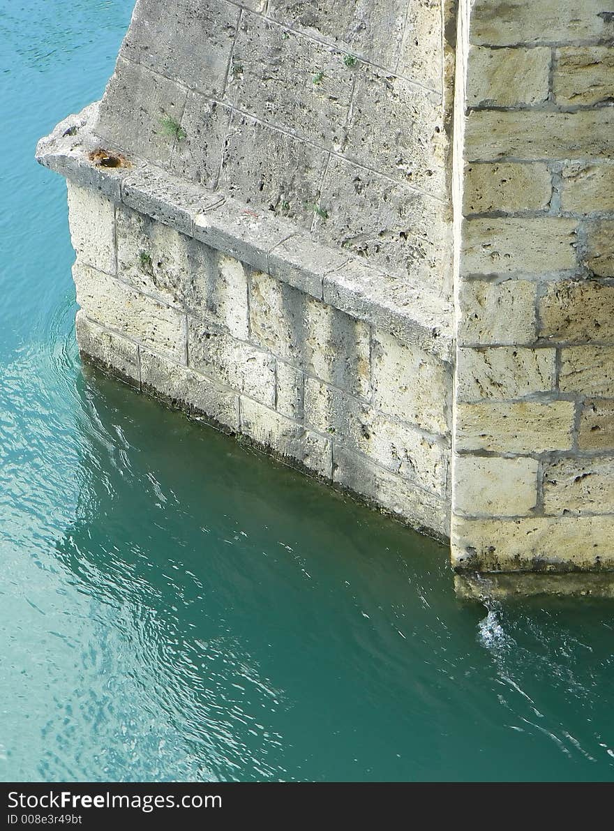 Old bridge pillar raising above the river Drina in Bosnia