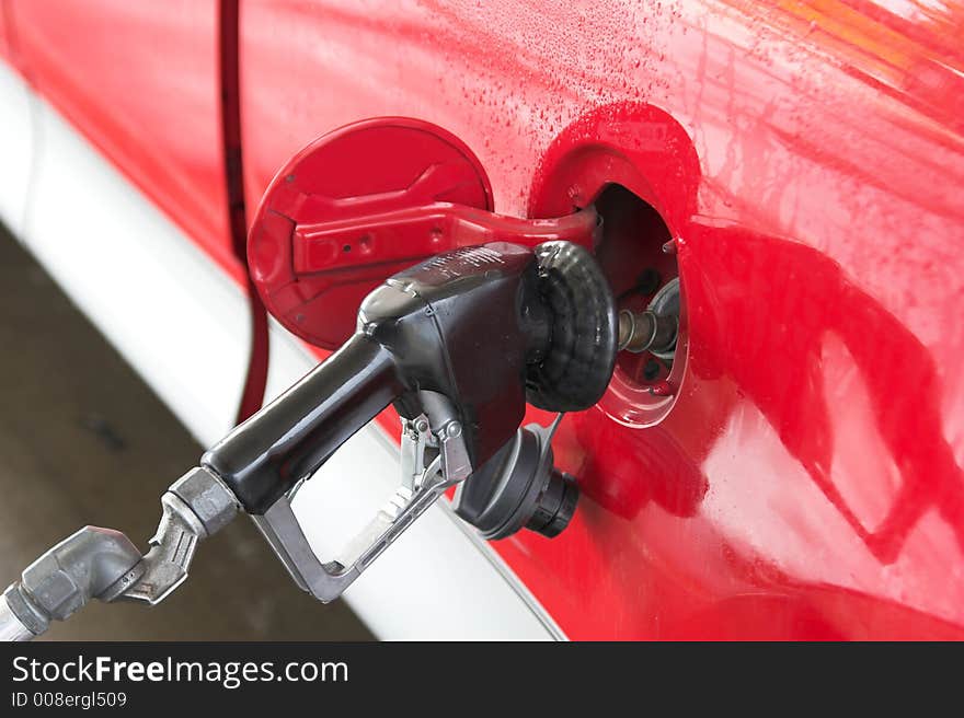 Filling up truck at local gas station. Filling up truck at local gas station