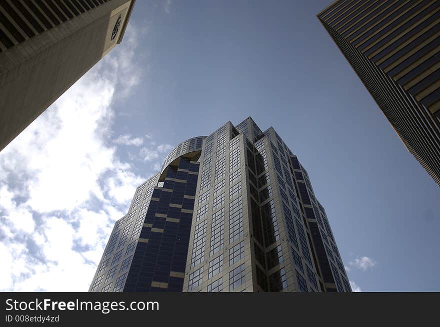 Downtown highrise under blue sky